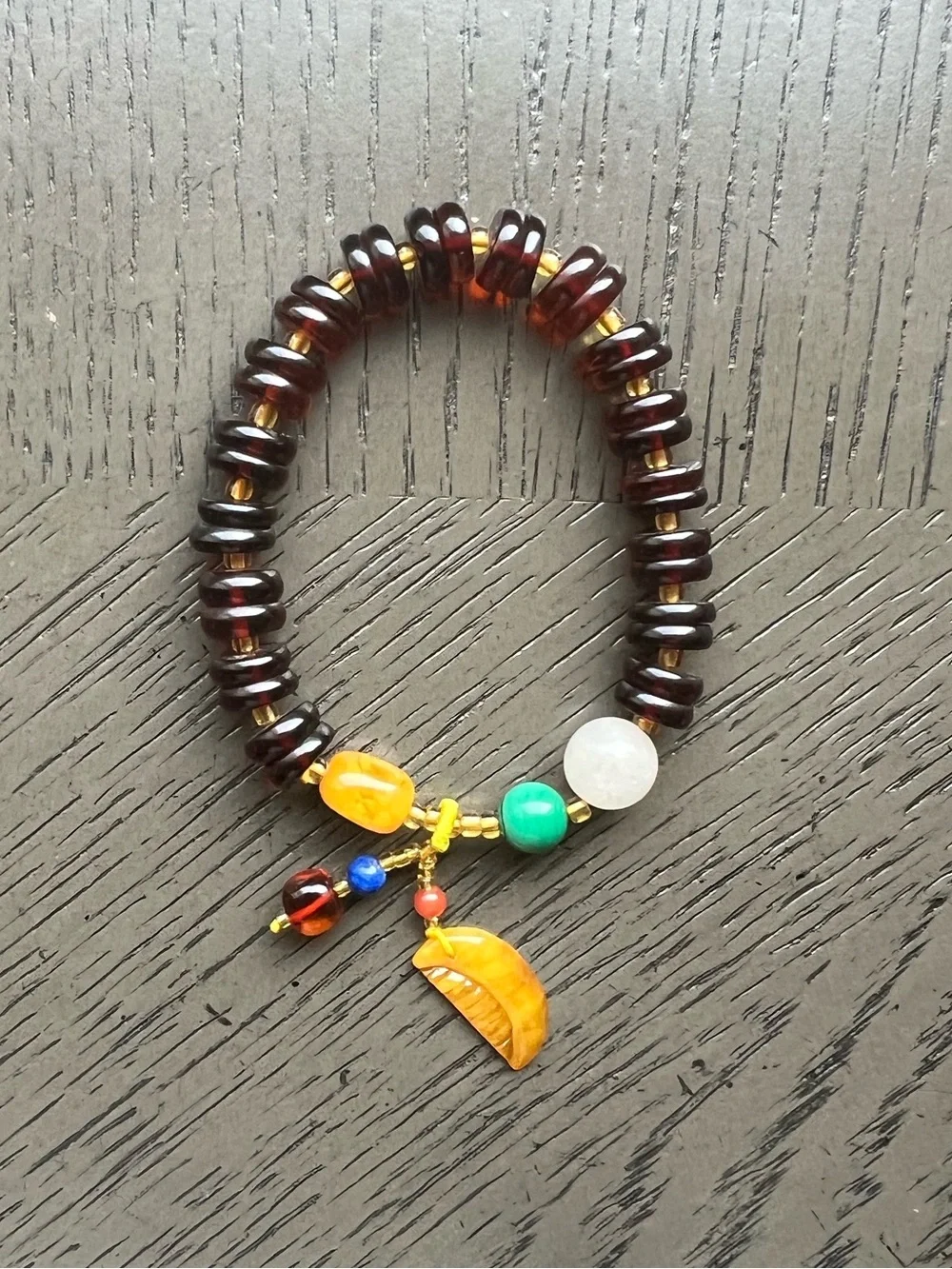 Blood Amber donut bracelet with charm 9mm SIZE 6.5’